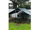 Backyard featuring a chicken coop with a covering for shade at 1835 Michigan Ne Ave, St Petersburg, FL 33703