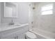 Bathroom with a tub and shower combination featuring new fixtures at 1835 Michigan Ne Ave, St Petersburg, FL 33703