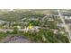 Aerial view showcasing the home's location within a neighborhood with easy access to amenities and green spaces at 1852 Longview Ln, Tarpon Springs, FL 34689