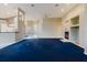 Expansive living room with open layout, fireplace, and tile flooring transitions at 1852 Longview Ln, Tarpon Springs, FL 34689