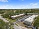 Aerial view of buildings with well-maintained landscaping and parking areas at 2003 Greenbriar Blvd # 1, Clearwater, FL 33763