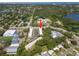 Community aerial view showing building locations, nearby pools, and water features at 2003 Greenbriar Blvd # 1, Clearwater, FL 33763