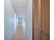 Tile hallway with view to living room at 2003 Greenbriar Blvd # 1, Clearwater, FL 33763