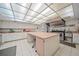 Commercial kitchen with island, stainless steel appliances, and ample counter space at 2003 Greenbriar Blvd # 1, Clearwater, FL 33763