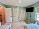 Bedroom featuring closet space, twin beds, and neutral carpeting at 2131 Ridge S Rd # 76, Largo, FL 33778