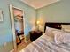 Bedroom closet featuring shelving, hanging space, and organized storage at 2131 Ridge S Rd # 76, Largo, FL 33778