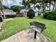 Outdoor grill with green space offering a place for barbecuing and enjoying the outdoors at 2131 Ridge S Rd # 76, Largo, FL 33778