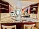 Updated kitchen with granite countertops, stainless steel appliances and a view of the breakfast nook at 2131 Ridge S Rd # 76, Largo, FL 33778