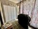 Enclosed patio featuring white bi-fold doors, modern furnishings and natural light at 2131 Ridge S Rd # 76, Largo, FL 33778