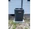 Goodman air conditioner unit sits on a concrete slab outside this cozy home at 22365 Panorama St, Brooksville, FL 34601