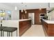Modern kitchen with a large center island, stainless steel appliances, and custom cabinetry at 234 Palm Sw Is, Clearwater Beach, FL 33767