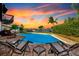 Stunning pool with a view of the harbor at sunset, perfect for relaxation and entertainment at 234 Palm Sw Is, Clearwater Beach, FL 33767