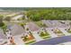 Aerial shot of single-Gathering homes with private screened pools, lawns, landscaping and private driveways in a quiet community at 241 Royal Palm Way, Spring Hill, FL 34608
