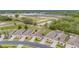 An aerial view capturing single-Gathering homes, complete with well-kept lawns and landscaping in a vibrant community at 241 Royal Palm Way, Spring Hill, FL 34608