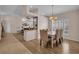 Dining room features a chandelier and is open to the living room at 241 Royal Palm Way, Spring Hill, FL 34608