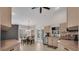 Bright kitchen features stainless steel appliances and lots of cabinet space at 241 Royal Palm Way, Spring Hill, FL 34608
