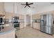 Bright kitchen with stainless steel appliances and lots of cabinet space at 241 Royal Palm Way, Spring Hill, FL 34608