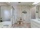Clean bathroom with a glass-enclosed shower, tiled floor, and ample counter space providing function and style at 2801 Gulf Blvd, Belleair Beach, FL 33786