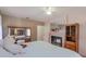 Charming bedroom showcases a cozy fireplace, carpet flooring, and ample closet space at 2801 Gulf Blvd, Belleair Beach, FL 33786