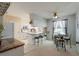 Cozy kitchen with an island and eat-in dining area; ample natural light and neutral tones at 2801 Gulf Blvd, Belleair Beach, FL 33786