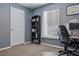 Office with a desk, neutral walls, carpet and natural light from the window at 30317 Rattana Ct, Wesley Chapel, FL 33545