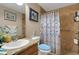 Cozy bathroom featuring a walk-in shower and beach themed decor for a spa-like experience at 3147 Sydney Dover Rd, Dover, FL 33527