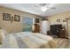 Bright bedroom with natural light, complete with a ceiling fan and wood-look flooring at 3147 Sydney Dover Rd, Dover, FL 33527