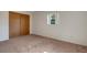 Bedroom featuring a window view, ceiling fan, and a double door closet at 3147 Sydney Dover Rd, Dover, FL 33527