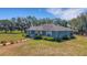 Exterior view of the home featuring attractive curb appeal, landscaping, and outdoor spaces at 3147 Sydney Dover Rd, Dover, FL 33527