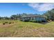 Single story home with a large lot and minimal landscaping at 3147 Sydney Dover Rd, Dover, FL 33527