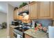 Modern kitchen with stainless steel appliances, and granite countertops at 3147 Sydney Dover Rd, Dover, FL 33527