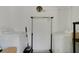 Practical laundry room with a washing machine, dryer, and clothing rack for convenience at 3147 Sydney Dover Rd, Dover, FL 33527