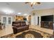 Spacious Living Room with a view of the kitchen and dining area, and access to the porch at 3147 Sydney Dover Rd, Dover, FL 33527