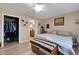 Spacious bedroom featuring a walk-in closet and ensuite bathroom for added convenience at 3147 Sydney Dover Rd, Dover, FL 33527