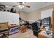A room with light-colored walls with laminate floors is being used as a storage area at 3147 Sydney Dover Rd, Dover, FL 33527