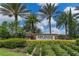 A view of the Esplanade at Starkey Ranch community sign surrounded by beautiful landscaping at 3167 Forsythia Dr, Odessa, FL 33556