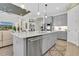 Kitchen with island, stainless steel appliances, and open floor plan at 3167 Forsythia Dr, Odessa, FL 33556