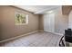 This bedroom features a large window offering natural light and a closet for storage at 3320 Jackson N St, St Petersburg, FL 33704