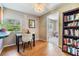 Cozy dining area with a table, chairs, and a view of the outdoor greenery at 3320 Jackson N St, St Petersburg, FL 33704