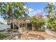 Charming two-story home with a wooden deck and lush landscaping at 3320 Jackson N St, St Petersburg, FL 33704