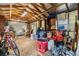 View of the garage interior filled with stored items and tools, showcasing ample storage space at 3320 Jackson N St, St Petersburg, FL 33704