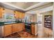 Well-equipped kitchen featuring wooden cabinetry, modern appliances, and an island at 3320 Jackson N St, St Petersburg, FL 33704