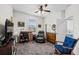 Bedroom featuring a ceiling fan, desk, chair, and window at 33219 Kateland Dr, Wesley Chapel, FL 33545