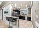 The clubhouse includes a stylish kitchen area with granite counters and stainless-steel appliances at 33219 Kateland Dr, Wesley Chapel, FL 33545