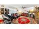 Comfortable living room with two couches, rug, and a ceiling fan at 3411 Landover Blvd, Spring Hill, FL 34609