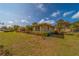 This well-maintained single-story home includes lush landscaping and a classic design at 501 Poinsettia Rd, Belleair, FL 33756
