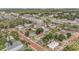 Charming neighborhood with brick streets, lush trees, and a mix of residential and commercial buildings at 504 Cleveland Ave, Largo, FL 33770