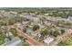 An aerial view of the neighborhood with brick streets and a lush tree canopy in a desirable community at 504 Cleveland Ave, Largo, FL 33770