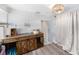 Cozy room with custom wood cabinet and storage at 504 Cleveland Ave, Largo, FL 33770