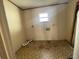 Laundry room with a window, and connections for a washer and dryer at 5124 Chilkoot St, Tampa, FL 33617